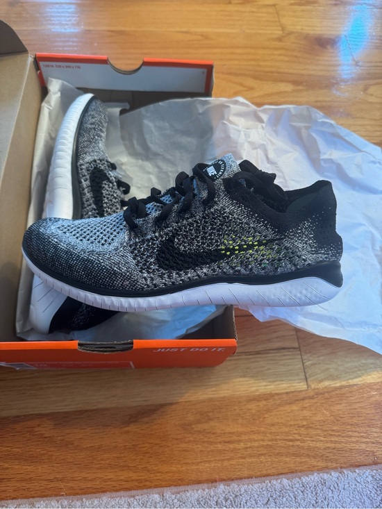 Nike Shoes - Nike Black & White Flyknit Sneakers - Size 10